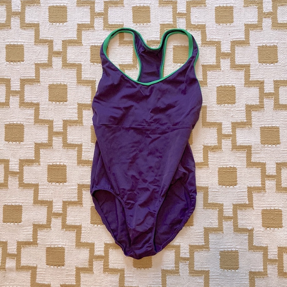 Adult M Class-In Racerback leotard. Purple with green trim.